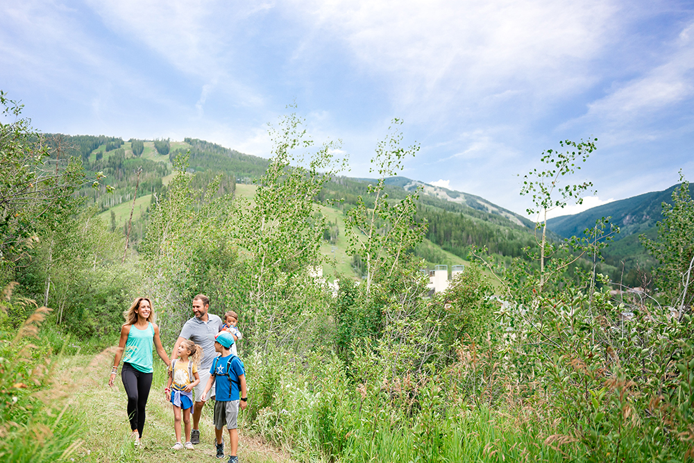 Family hiking in the summer in Beaver Creek, CO